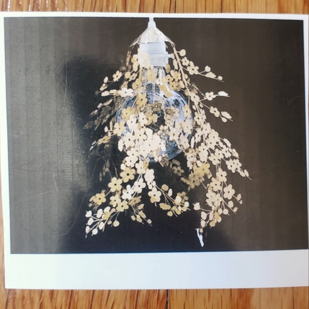 Delicate metal flower light cover/chandelier